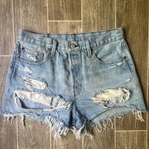 Levi’s 501 Distressed Light Blue Denim Shorts